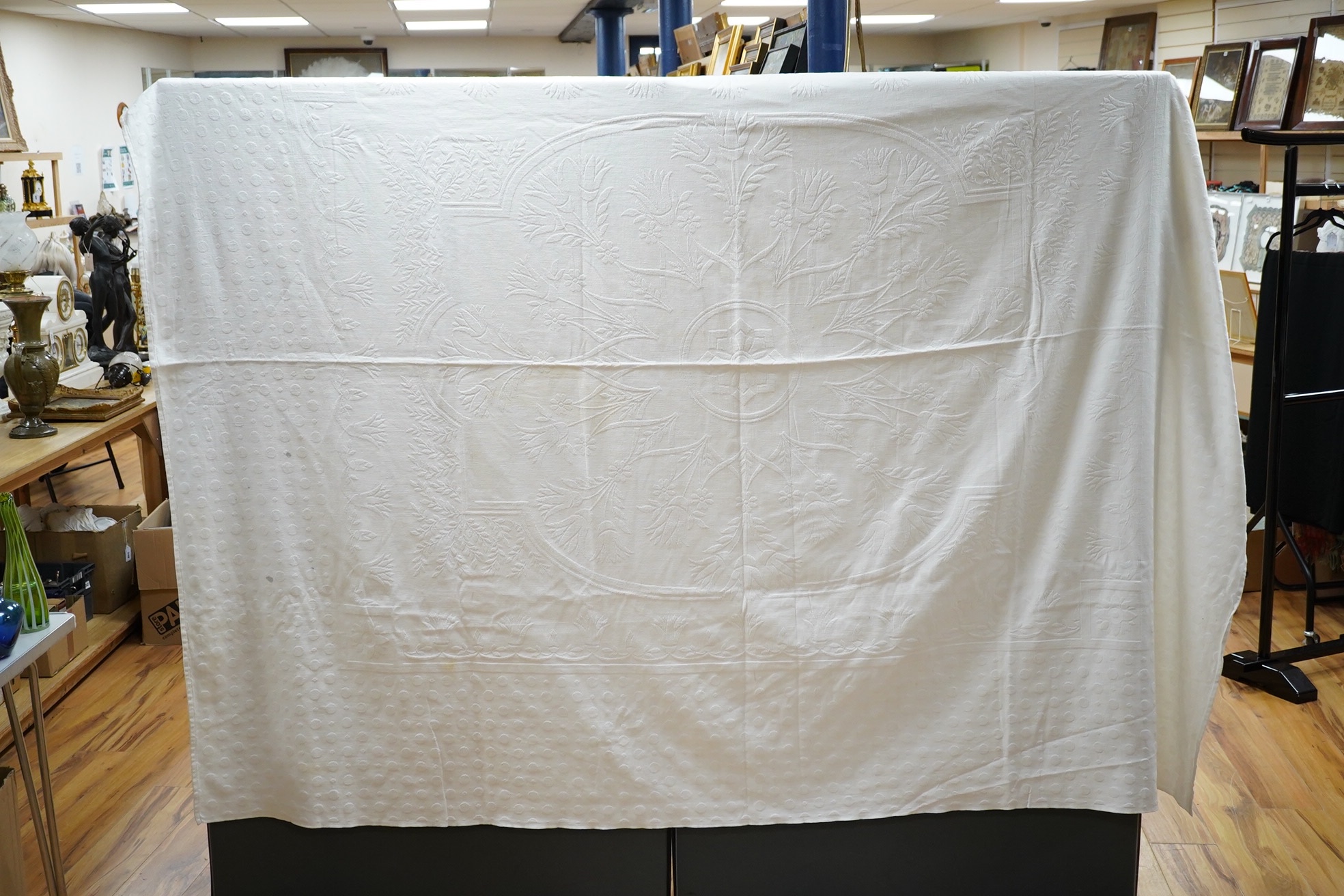 Three late 19th century white linen ‘Marcella’ style bedcovers, with inspired Christopher Dresser floral textile designs.